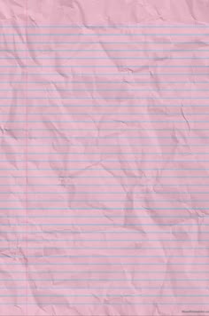a piece of pink lined paper on top of a white sheet of paper with lines