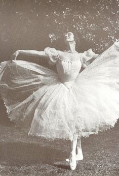 an old black and white photo of a ballerina