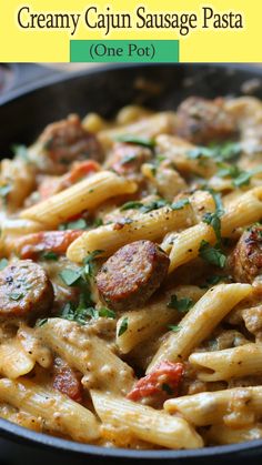 creamy cajun sausage pasta in a cast iron skillet
