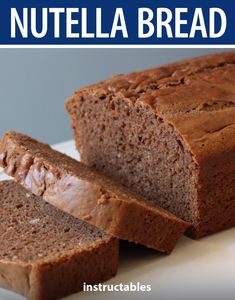 two slices of nutella bread on a white plate with the words nutella bread