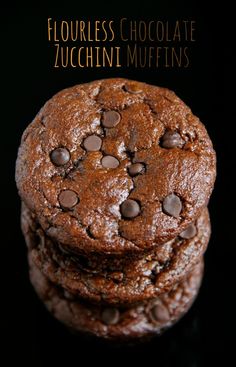chocolate cookies stacked on top of each other with the words flourless chocolate zucchini muffins