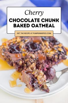 a piece of cherry chocolate chunk baked oatmeal on a plate with a fork