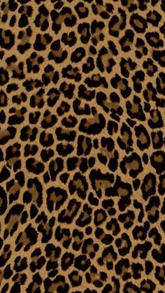 an animal print fabric with brown and black spots