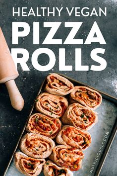 the healthy vegan pizza rolls are ready to be eaten and served on a baking sheet