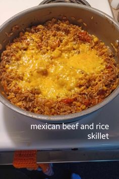 the mexican beef and rice skillet is ready to be cooked in the stove top