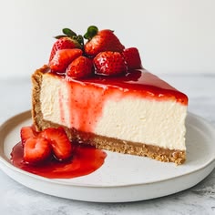 a slice of cheesecake with strawberries on top