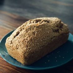 a loaf of bread sitting on top of a blue plate