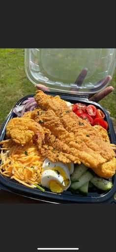 the meal is prepared and ready to be eaten on the picnic table or in the back yard