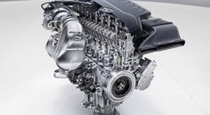 an engine is shown in the middle of a white floored area with light floors