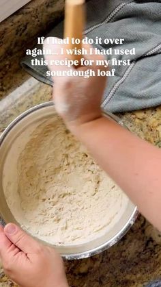 someone is mixing flour in a bowl on the counter