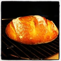 a loaf of bread sitting on top of a grill