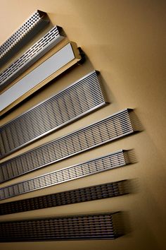 several metal strips are arranged on the wall