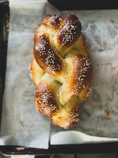 a loaf of bread with sesame seeds on top