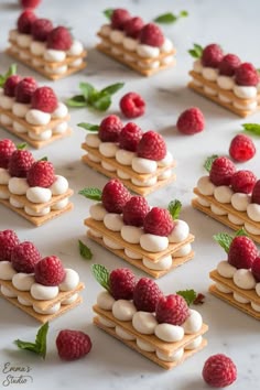 small desserts with raspberries and marshmallows on them
