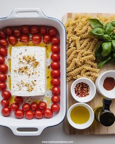 A cozy scene featuring a steaming plate of creamy baked feta pasta, with a natural sheen and inviting aroma, placed on a weathered wooden kitchen table, emphasizing the comforting and homey feel of a one-pan dinner.