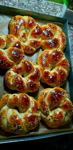 hot cross buns in a baking pan ready to be baked