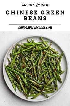 chinese green beans on a plate with the title