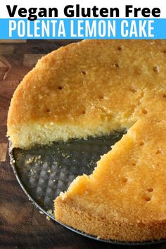 a vegan gluten - free polenta lemon cake on a wooden table