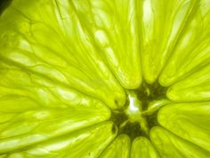 a close up view of the inside of a lime slice royalty images and stock photos