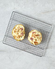 two biscuits sitting on top of a cooling rack