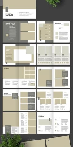 a bunch of papers that are laying on top of each other in front of some plants