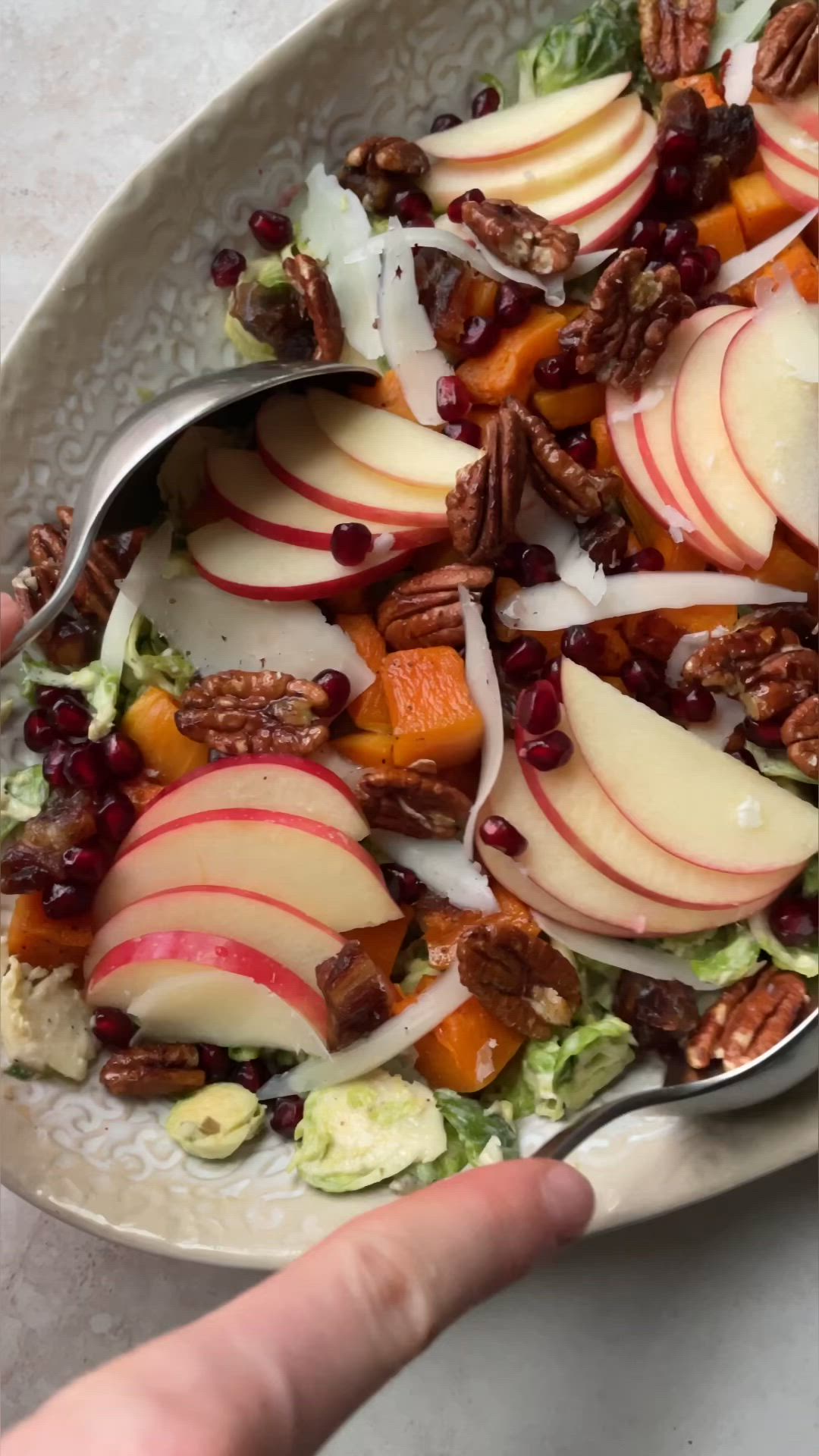 This contains: video of Winter Butternut Squash Brussels Sprouts Caesar Salad being made
