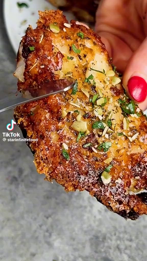 Sprinkle the grated parmesan on the baking sheet first.