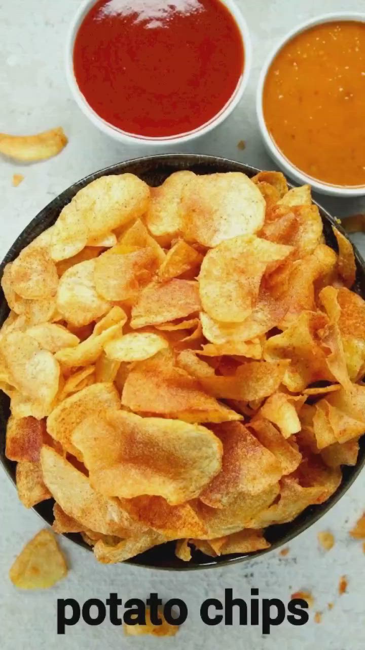 potato chips recipe | homemade potato wafers | aloo chips recipe with detailed photo and video recipe. an easy and crisp finger snacks recipe made with thinly sliced potatoes. it is perhaps one of the popular snacks among all age groups across the globe. it is made with minimal ingredients and topped with different flavour and seasoning, but this recipe describes about chilli flavoured alu chips. #WhatIsHealthyDietFood