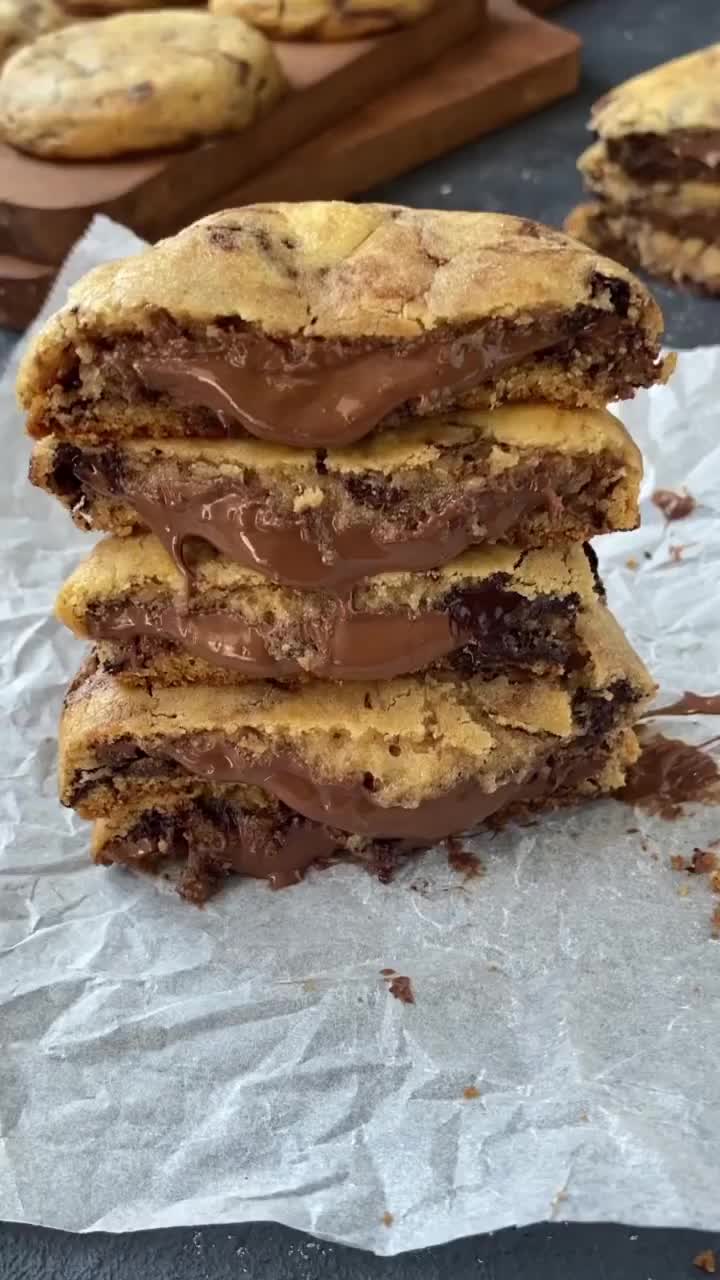 This contains an image of: Nutella-Stuffed Chocolate Chunk Cookies