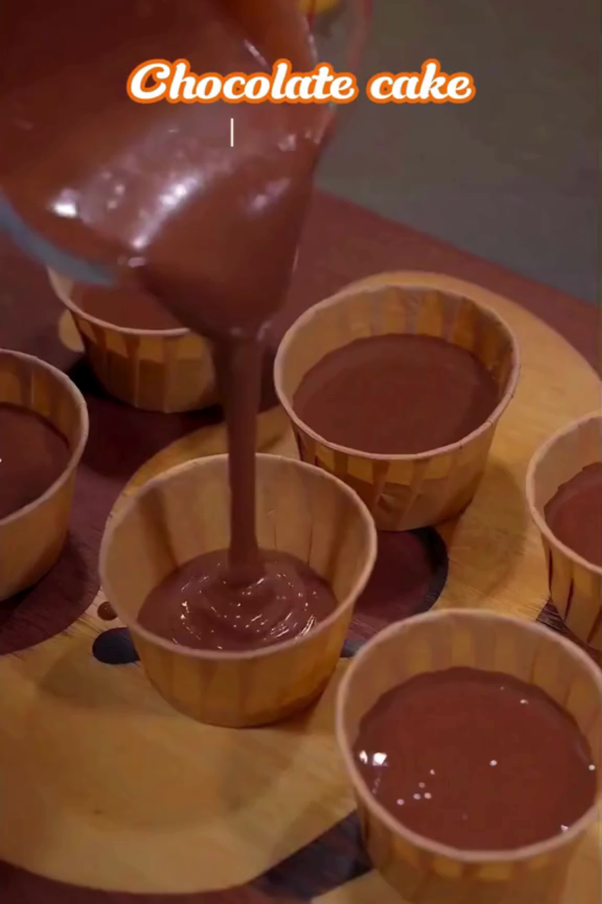 This contains: Delicious chocolate cupcakes with a crispy edge, baked to perfection in the airfryer. 🧁🍫✨ #AirfryerCupcakes #ChocolateDelight #DessertCraving