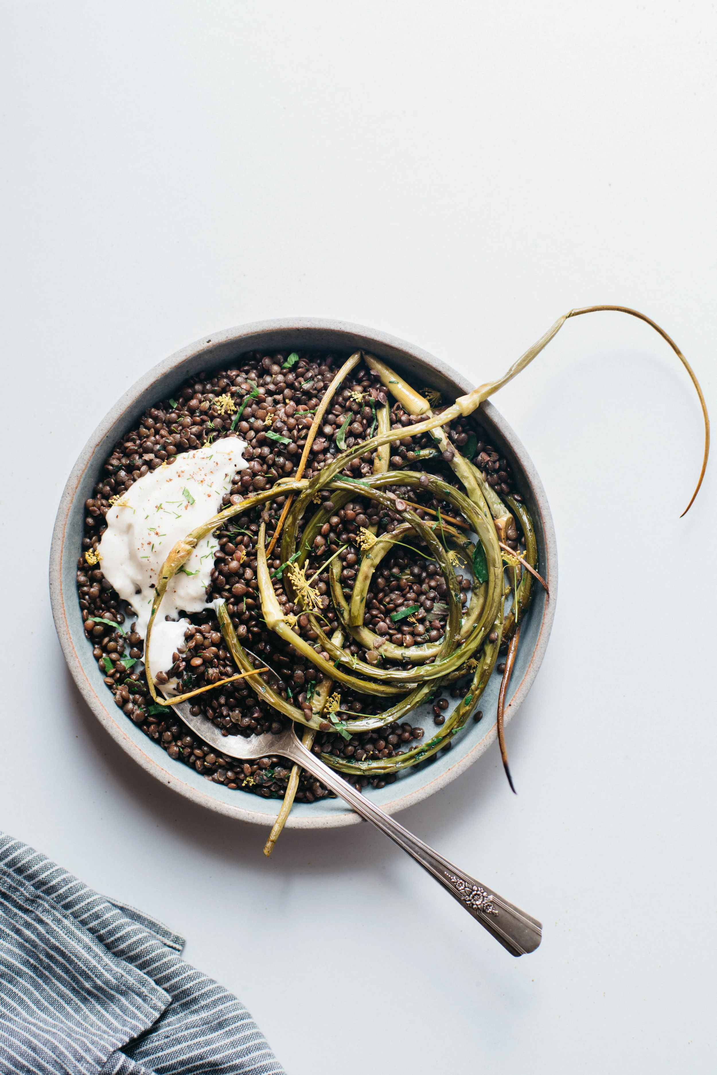 herbed black beluga lentils w/ garlic scapes + yogurt sauce | dolly and oatmeal