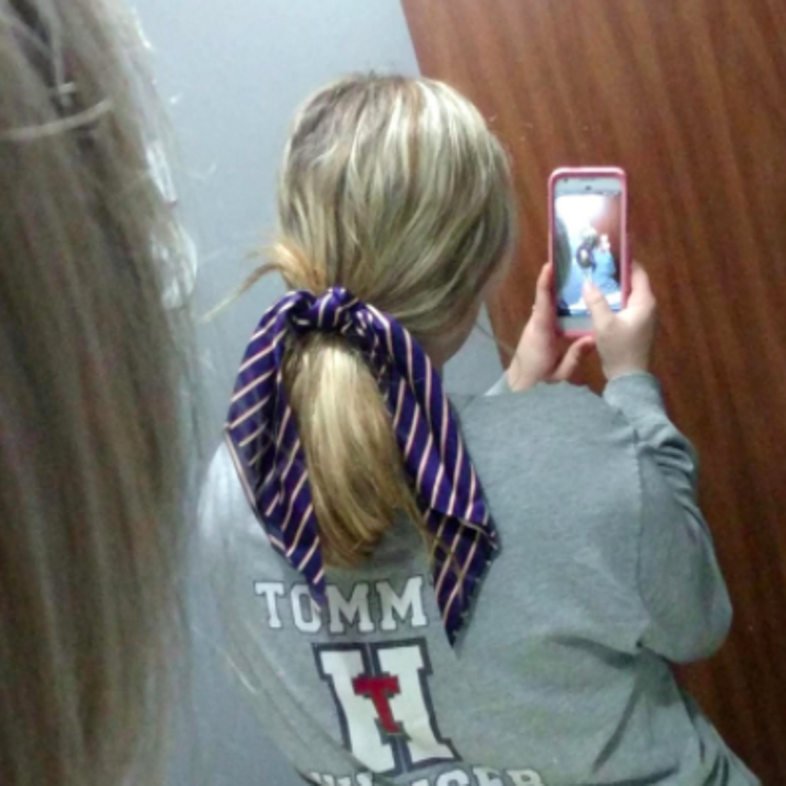 reviewer wearing striped scarf scrunchie