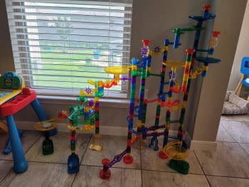 Reviewer showing the marble run set