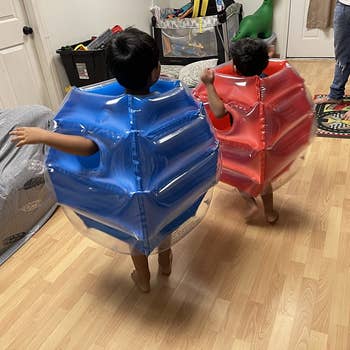 Reviewer's children wearing the body bumpers