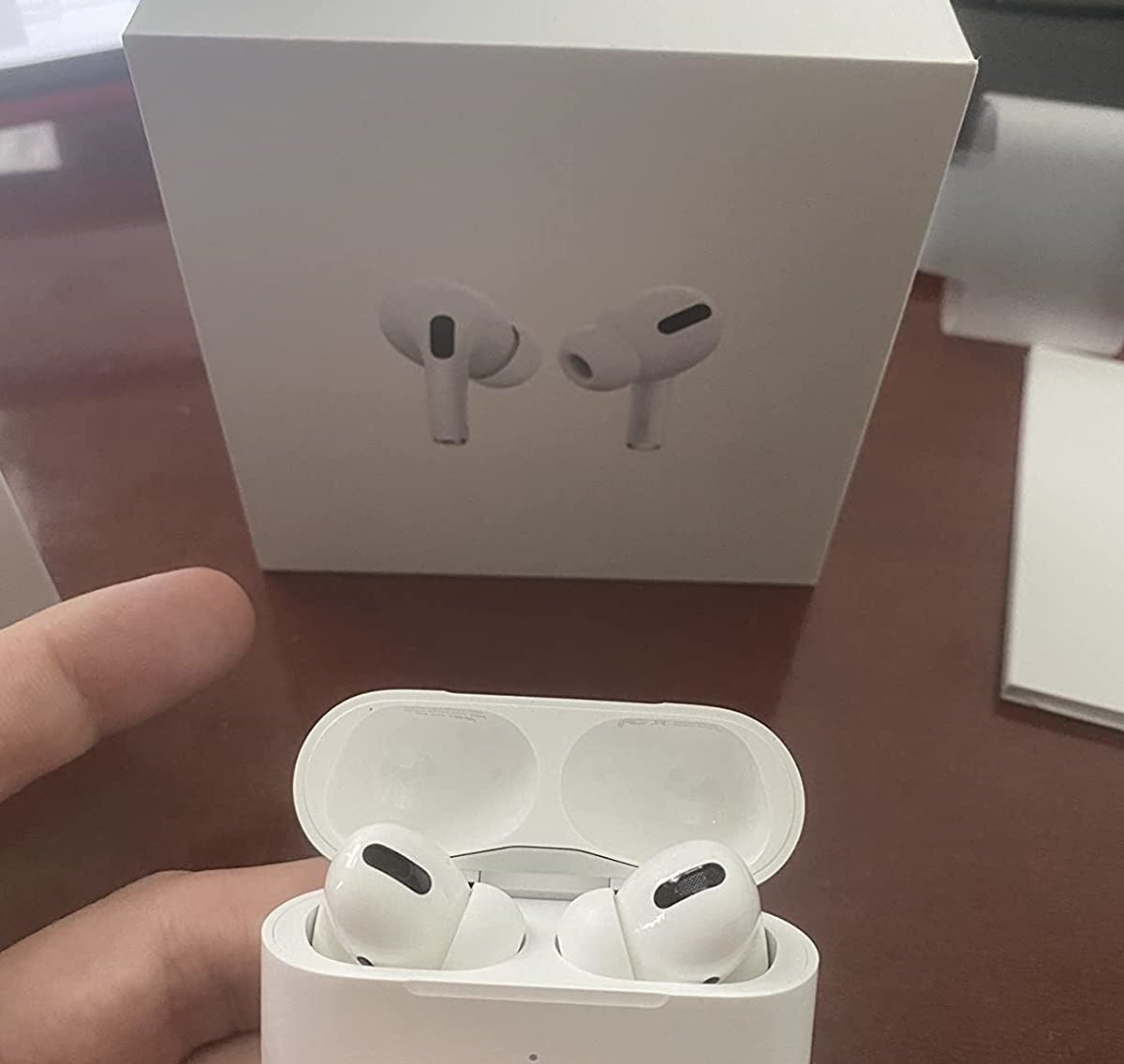 the airpods in their case