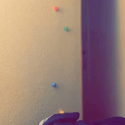 Reviewer's video showing the sticky balls sliding down the wall