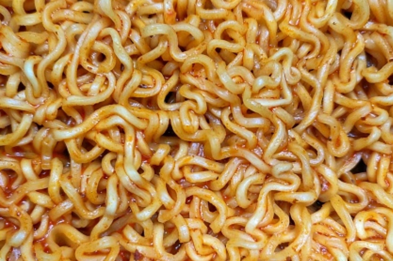 Close-up of cooked noodles with a light sauce