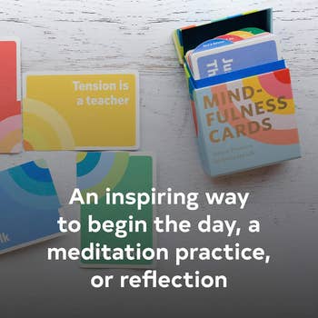 Mindfulness cards on a table with text: