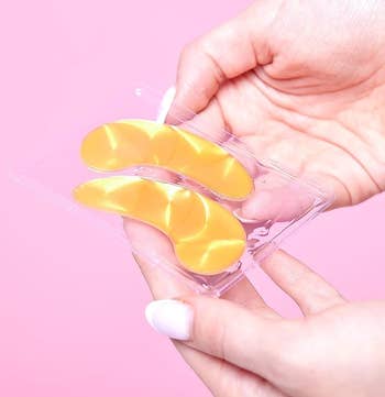 hand holding the cooling eye gels