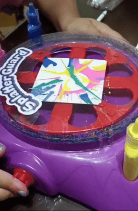 reviewer using plastic turn table with