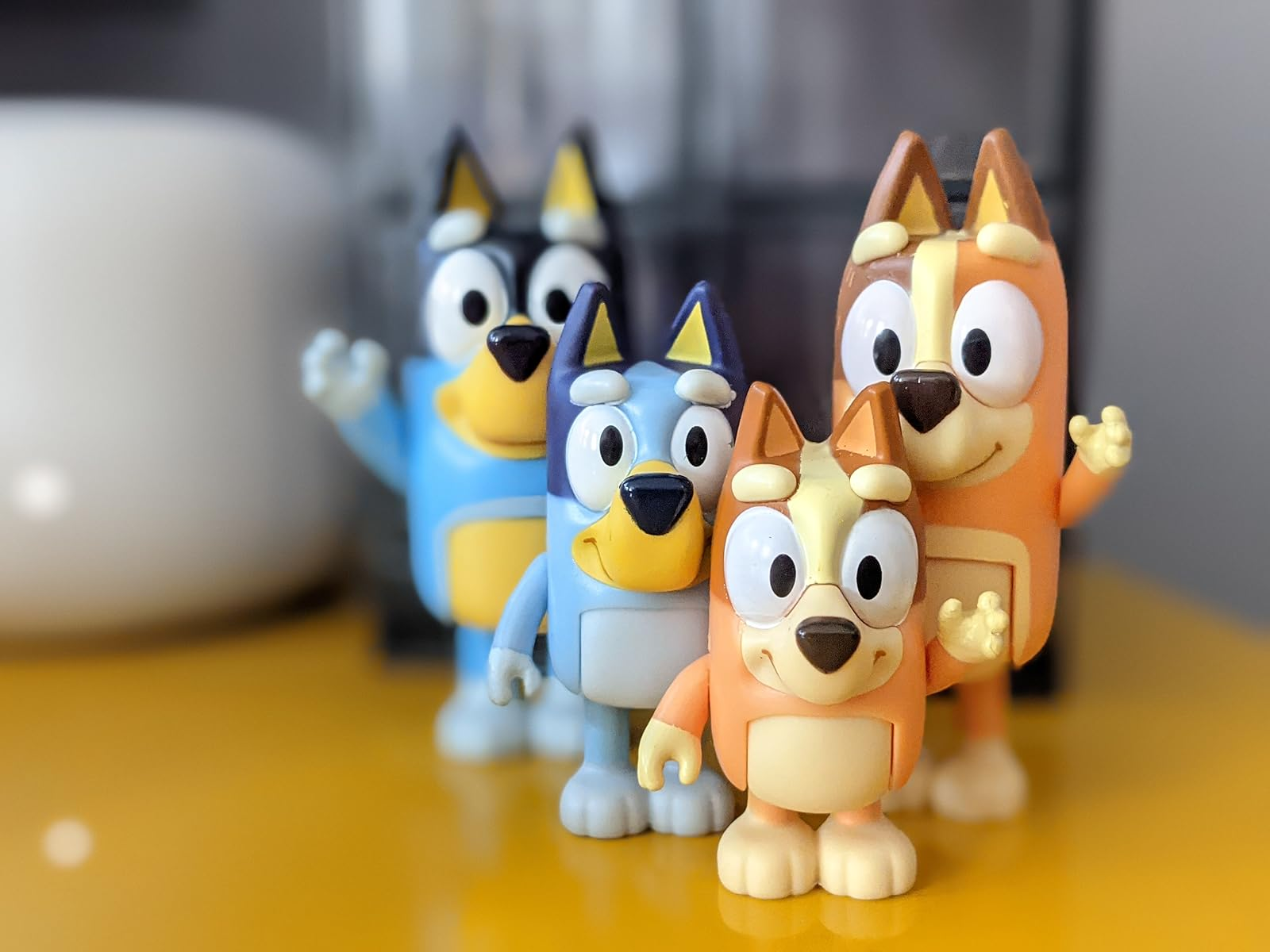 the four bluey figures