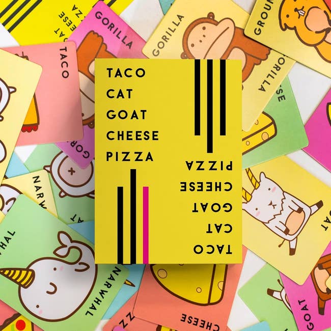 A colorful assortment of Taco Cat Goat Cheese Pizza game cards featuring whimsical animal illustrations