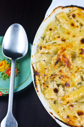 mac and cheese on black with spoon