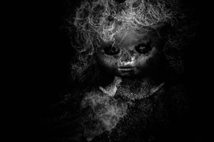 Macabre image of a decaying doll. Macabre image of a decaying doll