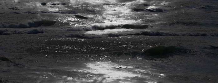 Abstract photo of ocean waves with night clouds. Abstract photo of ocean waves with night clouds.