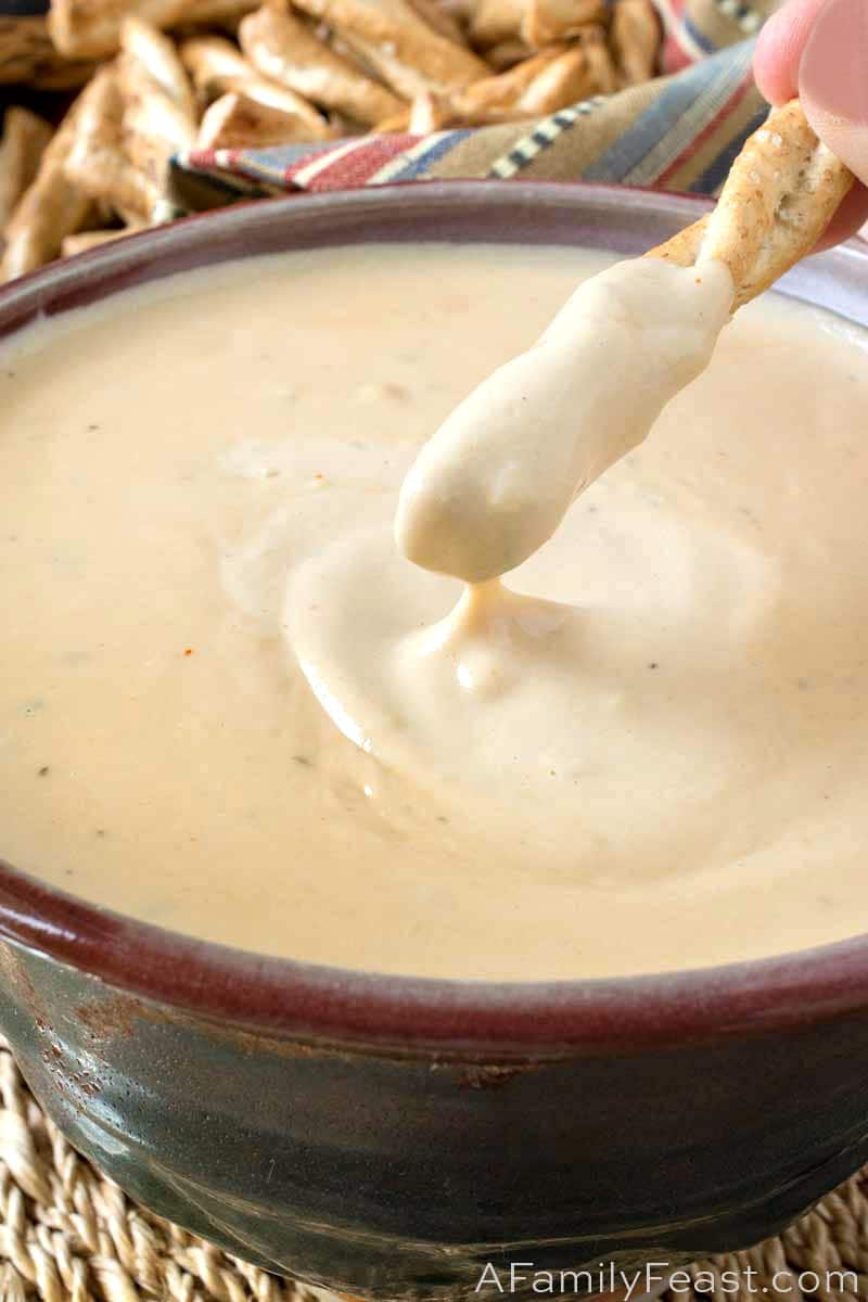 Our Cheesy Beer Pretzel Dip has four kinds of melty cheese and dark ale combined into a zesty, flavorful dip that’s perfect with pretzels. Cheesy Beer Pretzel Dip
