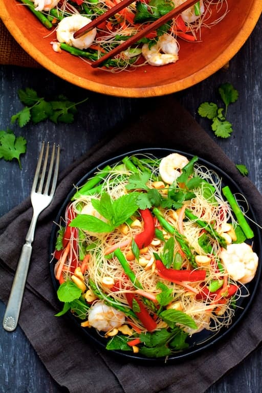 Photo of Vietnamese Spring Roll Salad on black plate.
