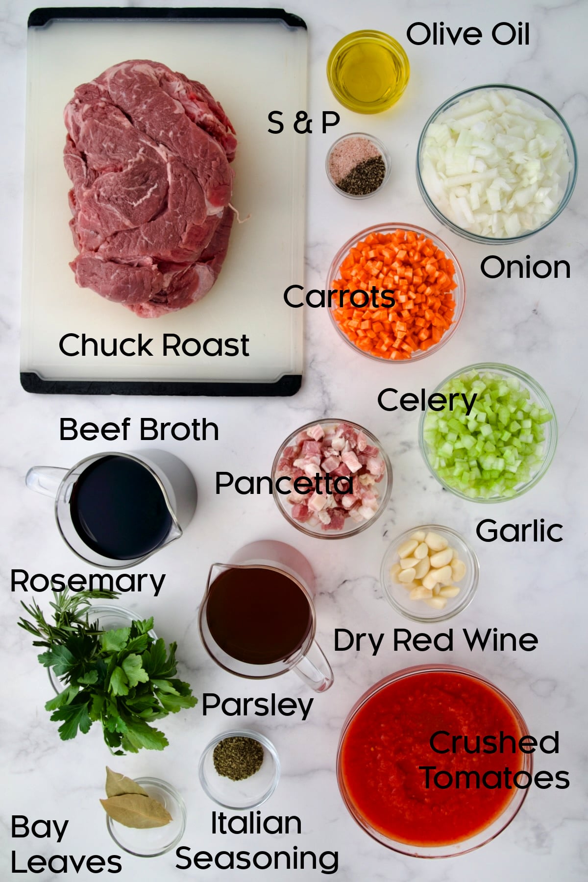 Ingredients for Italian Pot Roast (Stracotto) in glass bowls.