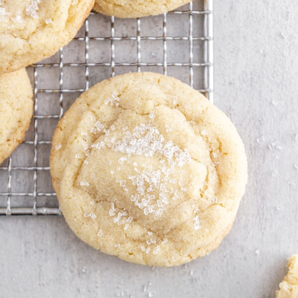 chewy sugar cookies on a cooling rack.