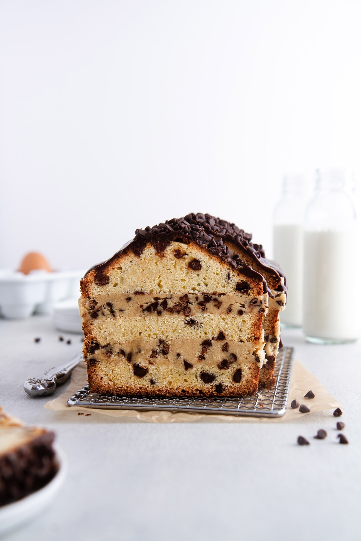 cookie dough stuffed pound cake on a cooling rack